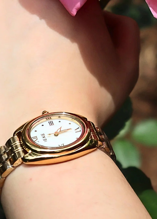 IEKE Xerxes – Montre dorée au charme intemporel & cadran blanc raffiné